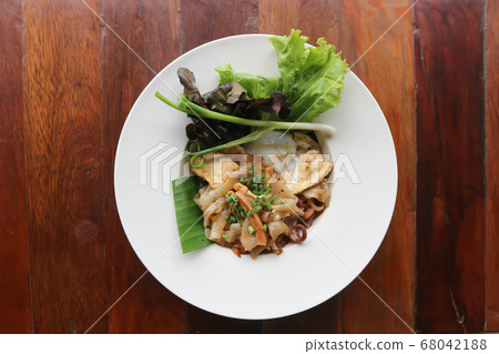 stir fried noodles with pork and fried egg stir fried noodles with pork and fried egg 68042188