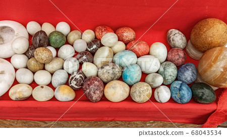 Lots of colorful and bright Easter Eggs made by marble stone in Anatolia, Turkey Lots of colorful and bright Easter Eggs made by marble stone in Anatolia, Turkey 68043534