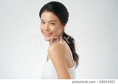 Beautiful Young asian Woman with Clean Fresh Skin, Face care, Facial treatment. Cosmetology, beauty Beautiful Young asian Woman with Clean Fresh Skin, Face care, Facial treatment. Cosmetology, beauty 68043987