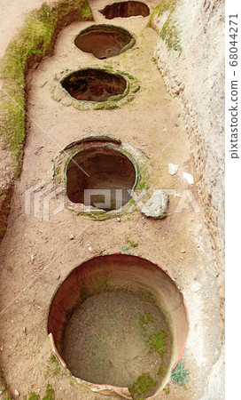 Ancient and secret Gumusler ruins and the monastery surrounded by walls and stones in Cappadocia, Gumusler, Nigde Ancient and secret Gumusler ruins and the monastery surrounded by walls and stones in Cappadocia, Gumusler, Nigde 68044271