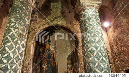 Gumusler Monastery from inside. Sacred Frescos on the wall of the Cave Church in Cappadocia Gumusler Monastery from inside. Sacred Frescos on the wall of the Cave Church in Cappadocia 68044405
