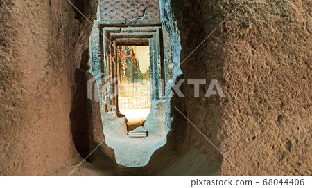 Gumusler Monastery from inside. Sacred Frescos on the wall of the Cave Church in Cappadocia Gumusler Monastery from inside. Sacred Frescos on the wall of the Cave Church in Cappadocia 68044406