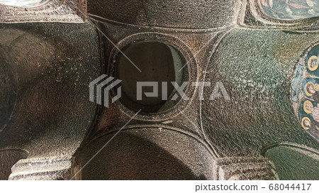 Gumusler Monastery from inside. Sacred Frescos on the wall of the Cave Church in Cappadocia Gumusler Monastery from inside. Sacred Frescos on the wall of the Cave Church in Cappadocia 68044417