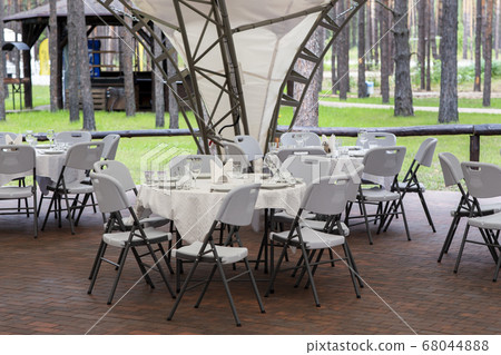 Banquet hall in the restaurant. Table served for Banquet hall in the restaurant. Table served for 68044888