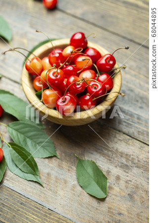 Fresh cherry fruit and leaf Fresh cherry fruit and leaf 68044895