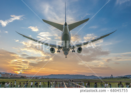 Osaka International Airport landing plane blue sky sunset sunset 68045755