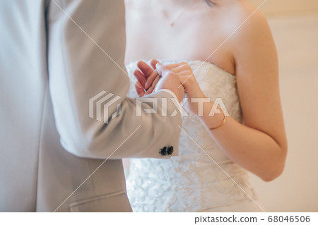 Couple vows at a wedding Couple vows at a wedding 68046506