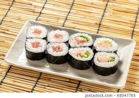 Assorted sushi rolls. Iron fire roll and Negi Toro roll. 68047765
