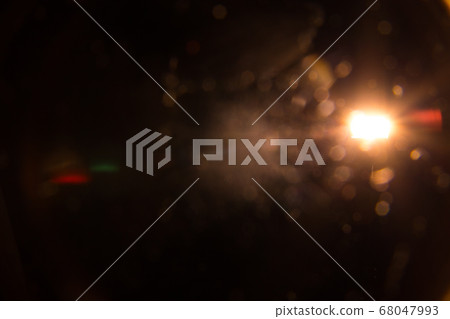digital lens flare in black bacground horizontal frame. digital lens flare in black bacground horizontal frame. 68047993