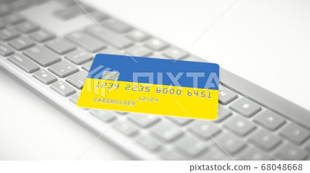 Plastic bank card depicting flag of Ukraine on computer keyboard. Fictional numbers Plastic bank card depicting flag of Ukraine on computer keyboard. Fictional numbers 68048668