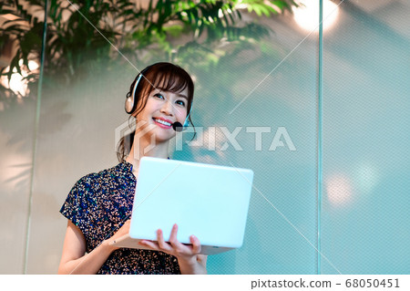 Operator chatting in the office Operator chatting in the office 68050451