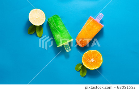 Flat lay of set fruit ice cream on colorful paper Flat lay of set fruit ice cream on colorful paper 68051552