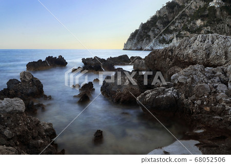 Capri, Marina Piccola. Quiet evening on the rocks by the sea 68052506