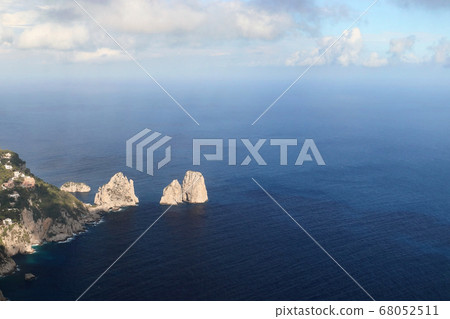 Capri, cliffs under the sun and endless sea 68052511