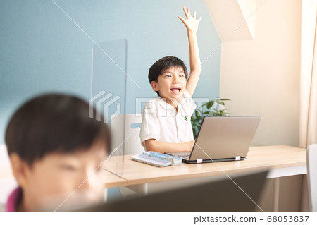 Boy raising hands 68053837