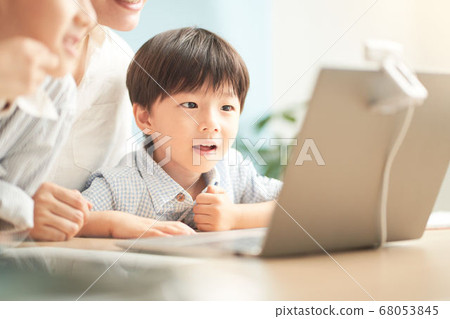 Boy making a video call Boy making a video call 68053845
