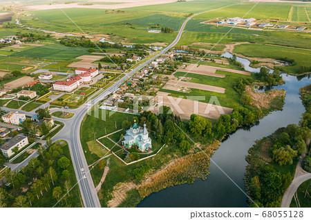 Krupets, Dobrush District, Gomel Region, Belarus. Aerial View Of Old Wooden Orthodox Church Of The Holy Trinity At Sunny Autumn Day Krupets, Dobrush District, Gomel Region, Belarus. Aerial View Of Old Wooden Orthodox Church Of The Holy Trinity At Sunny Autumn Day 68055128