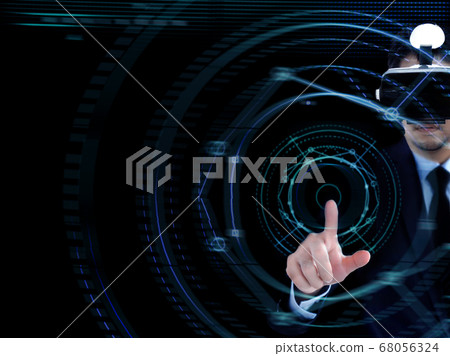 asian man with VR glass pointing on digital asian man with VR glass pointing on digital 68056324