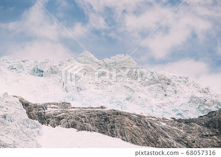 Jostedalsbreen National Park, Norway. Close Up View Of Melting Ice And Snow On Boyabreen Glacier In Summer Sunny Day. Famous Norwegian Landmark And Popular Destination. Close Up 68057316
