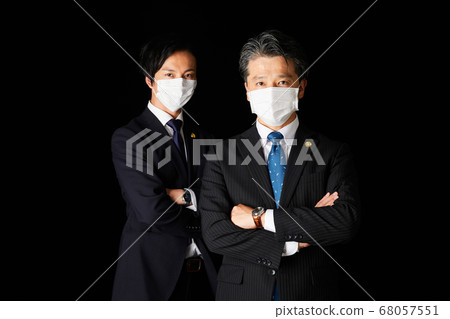 Two male lawyers wearing masks [Mask suit lawyer badge] 68057551