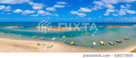 Small Fishing Boats anchored in a shallow lagoon, Aerial image. Small Fishing Boats anchored in a shallow lagoon, Aerial image. 68057809