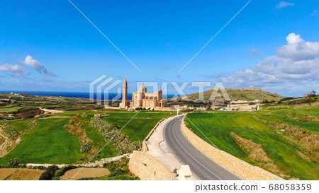 Aerial view over Basilica Ta Pinu in Gozo - a national shrine 68058359