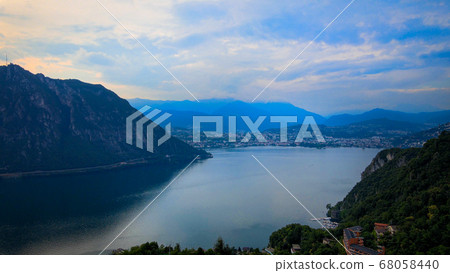 Aerial view over the Lake Lugano in Switzerland - evening view 68058440
