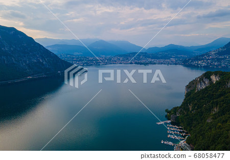 Aerial view over the Lake Lugano in Switzerland - evening view 68058477