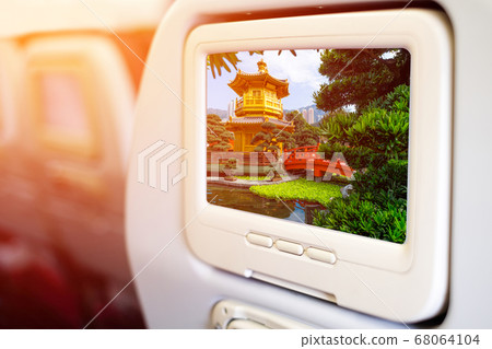 Aircraft monitor in front of passenger seat 68064104