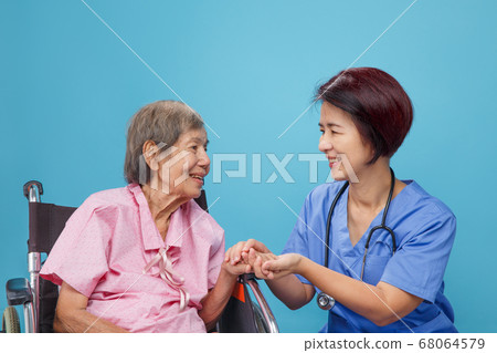 elderly woman happiness talking with doctor 68064579