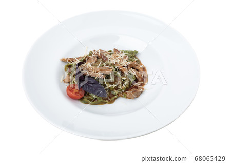 Tagliatelle spinach pasta with beaf and cheese. 68065429
