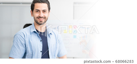 Young man owner startup business and looking at camera with smile 68066283