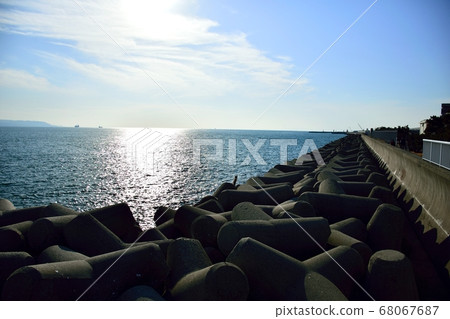 Tetra pot lining the coast 68067687