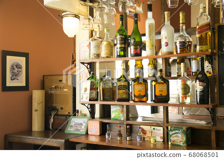 Several types of bottled alcohol are displayed on 68068501