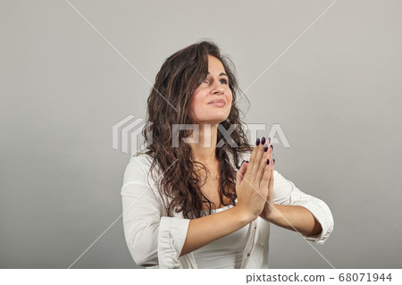 Folded hands together praying asking god help ask implore wish upwards jesus 68071944