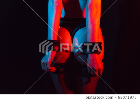 sexy ass girl with hands in leather handcuffs for BDSM sex 68071973