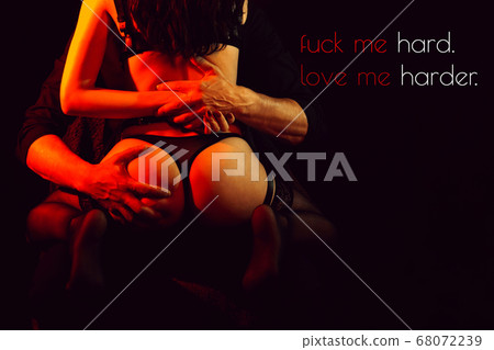 man firmly squeezes the hands of a sexy ass girl in underwear man firmly squeezes the hands of a sexy ass girl in underwear 68072239