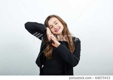 Tired Woman Puts Head On Her Hands And Tries To Sleep. Sleepy, Exhausted People Tired Woman Puts Head On Her Hands And Tries To Sleep. Sleepy, Exhausted People 68073415