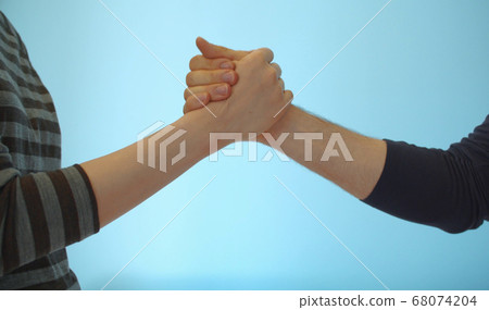 Hands of couple doing fist bump 68074204