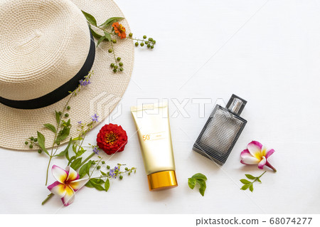 sunscreen spf50 cosmetics health care for skin face with hat ,perfume and flower frangipani ,zinnia of lifestyle woman sunscreen spf50 cosmetics health care for skin face with hat ,perfume and flower frangipani ,zinnia of lifestyle woman 68074277