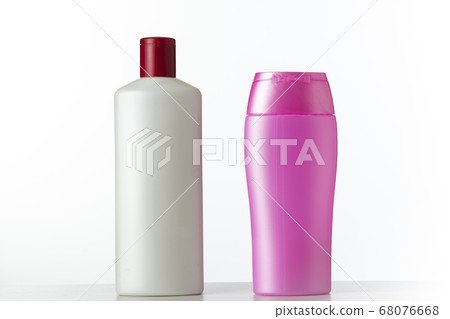 Two nameless plastic bottles white and pink from 68076668