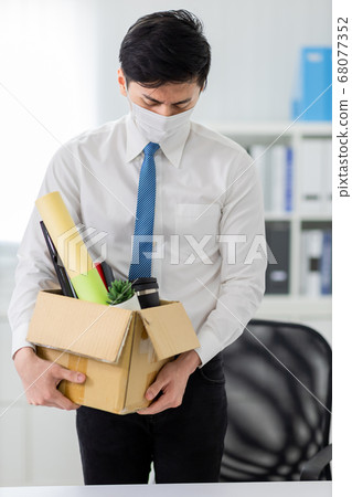 Asian businessman being fired Asian businessman being fired 68077352