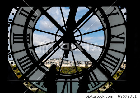 Paris cityscape through the giant glass clock at the Musee d'Orsay Paris cityscape through the giant glass clock at the Musee d'Orsay 68078311