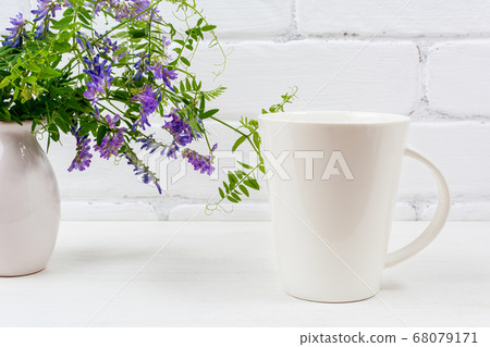 White coffee latte mug mockup with purple bird White coffee latte mug mockup with purple bird 68079171
