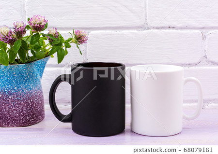 White and black mug mockup with pink clover White and black mug mockup with pink clover 68079181