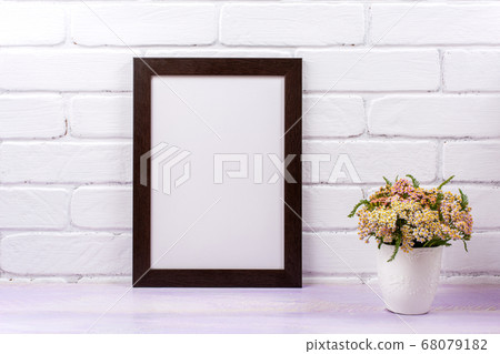 Black brown poster frame mockup with pink yarrow Black brown poster frame mockup with pink yarrow 68079182