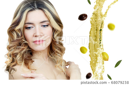 Beautiful woman near splash of olive oil. Skincare concept. Beautiful woman near splash of olive oil. Skincare concept. 68079238