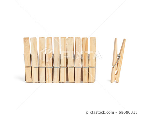 new wooden clothespins isolated on white new wooden clothespins isolated on white 68080313