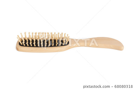 new wooden comb with handle isolated on white new wooden comb with handle isolated on white 68080318
