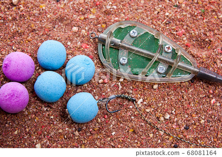 Dry feed for carp fishing as background. Ready for Dry feed for carp fishing as background. Ready for 68081164